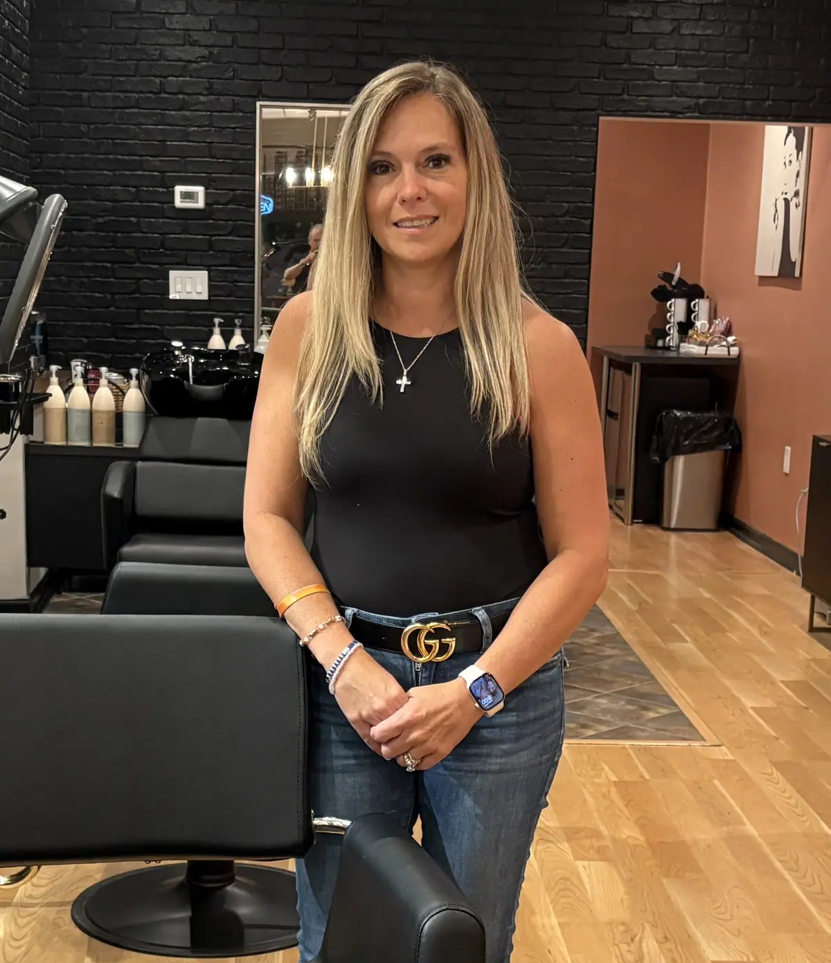 Nicole DeLalla, owner and stylist of Ciao Bella Hair Studio, in her Hillsdale salon