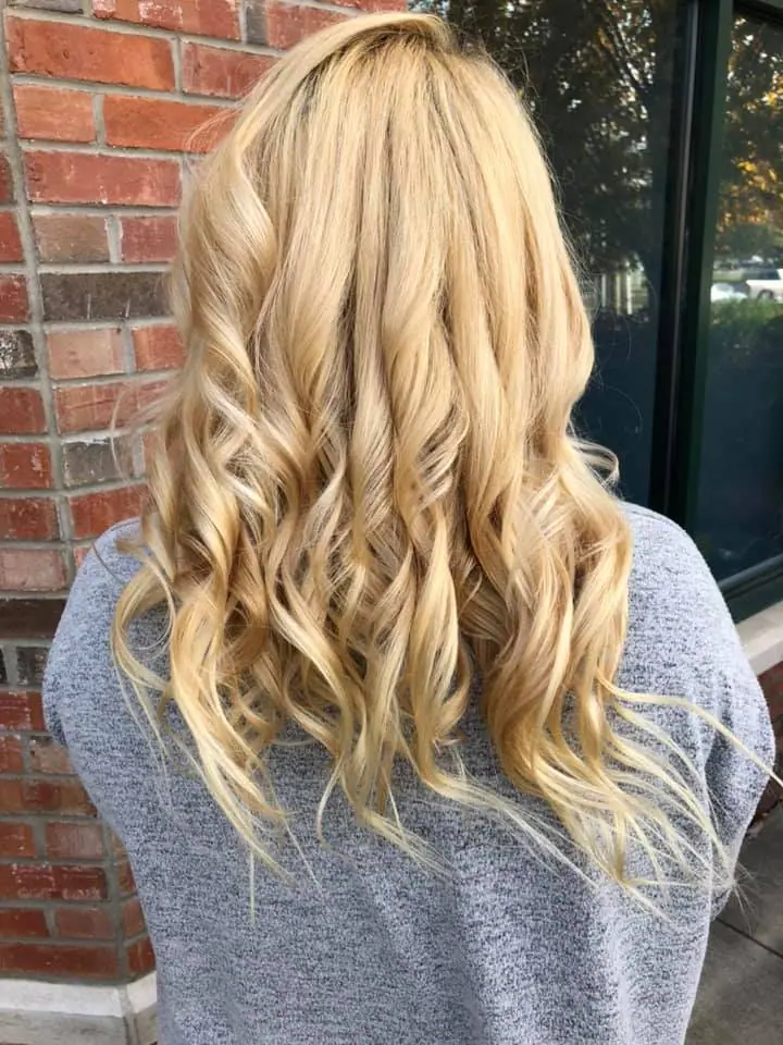 Soft, bright blonde waves with dimensional highlights